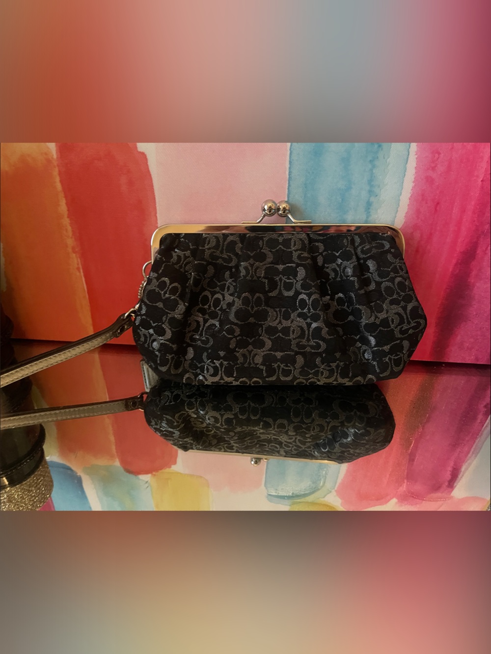 Coach signature  Patterned kiss lock Frame-Top Wristlet Bag